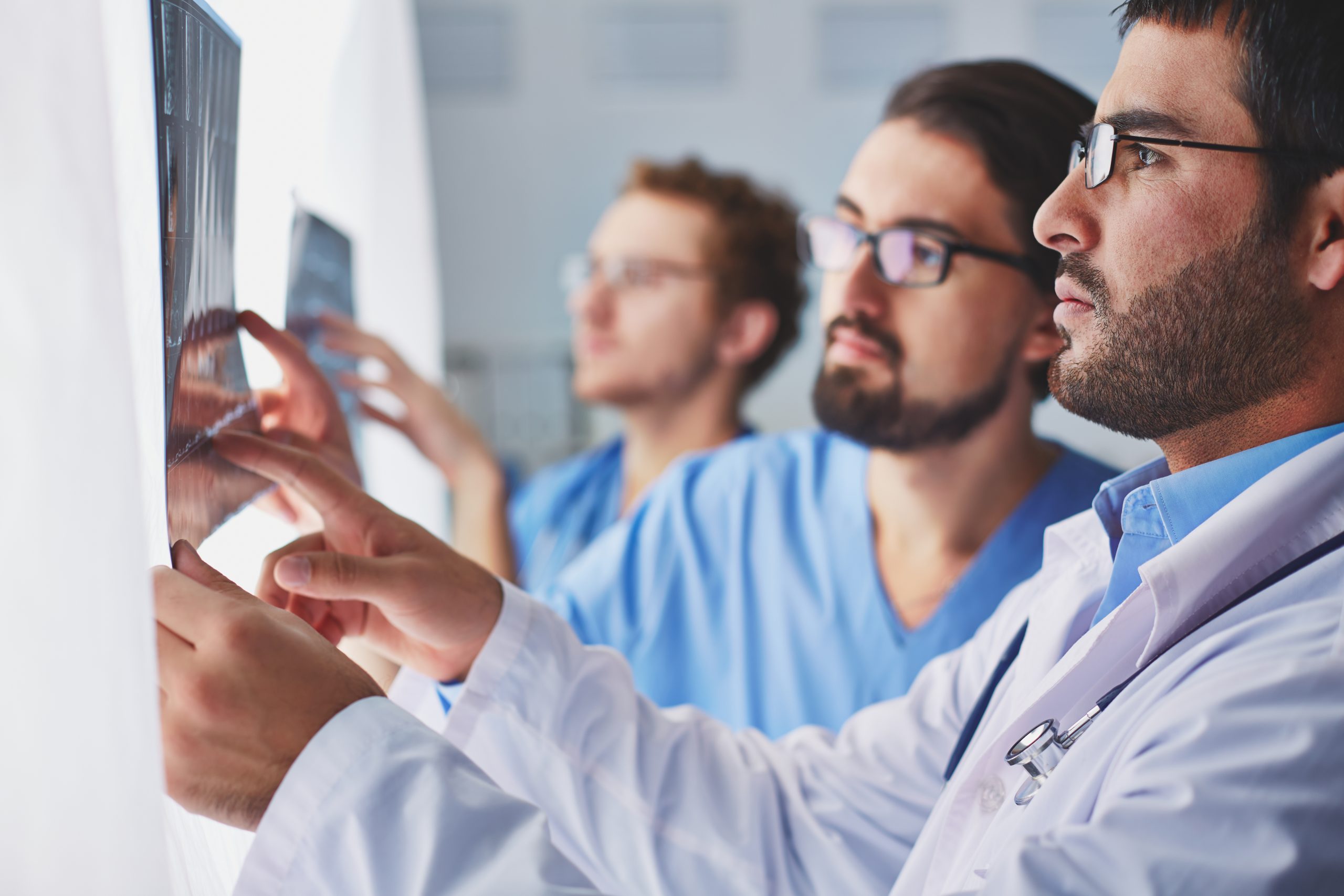 Dentists reviewing a dental x-ray